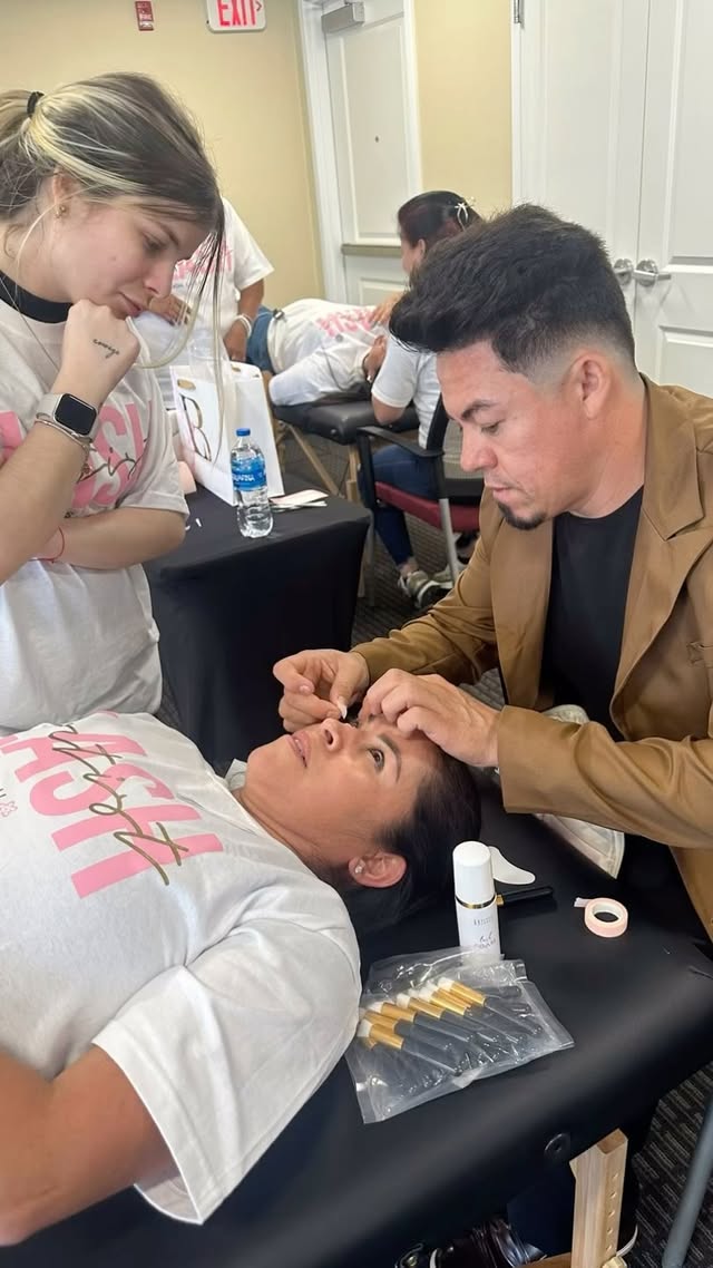 Jose Manuel performing a precision brow service for a client